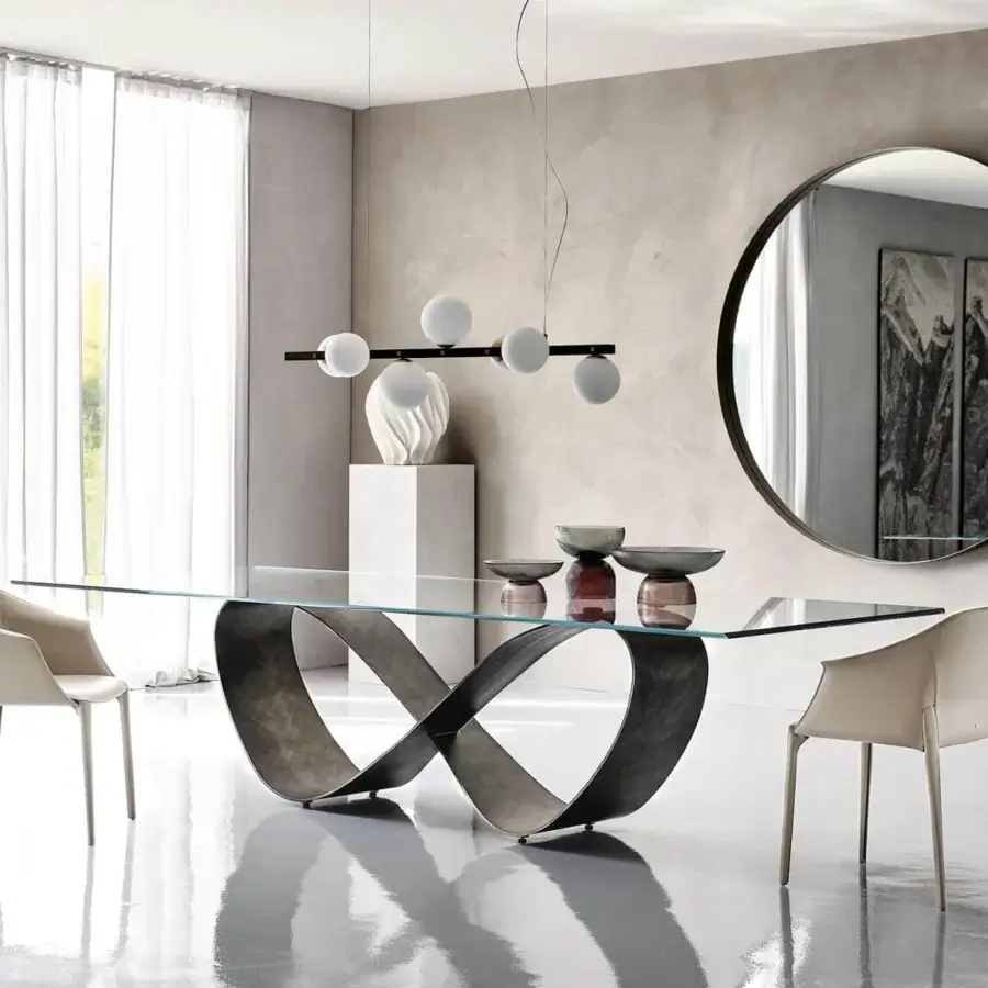 Elegant Cattelan Italia Zuleika armchair with a metal structure and light beige leather offering ergonomic support