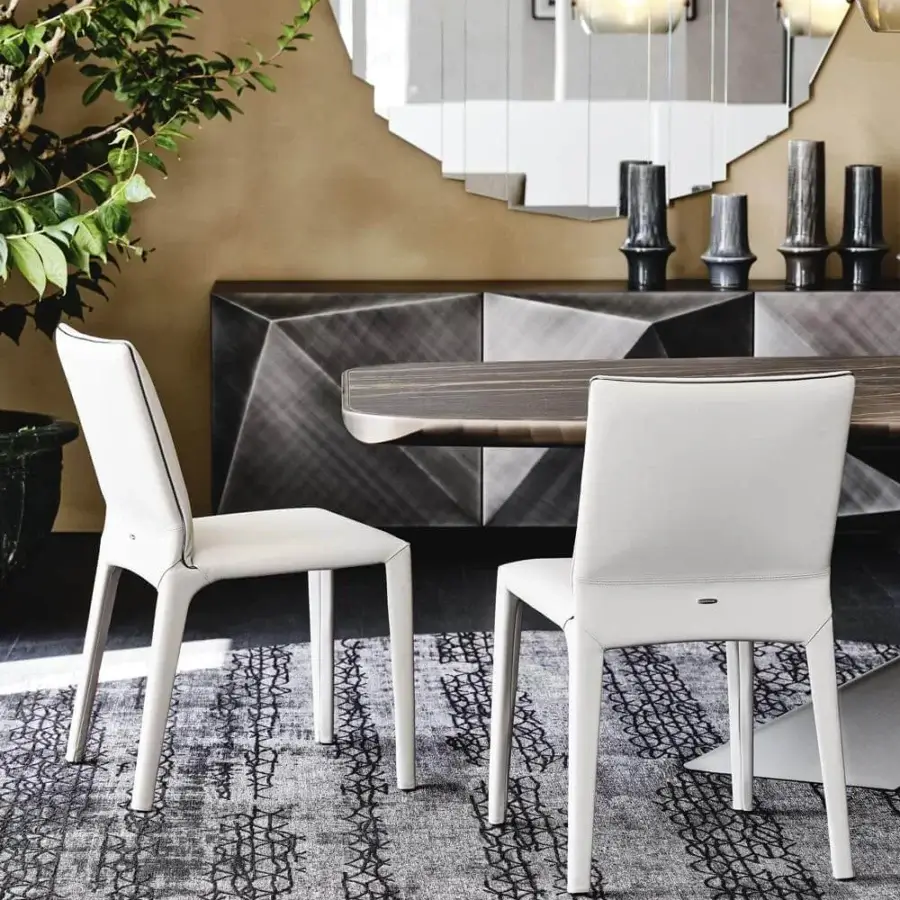 Superior Cattelan Italia Penelope chair with white soft leather and gun metal grey trim built upon a white steel frame