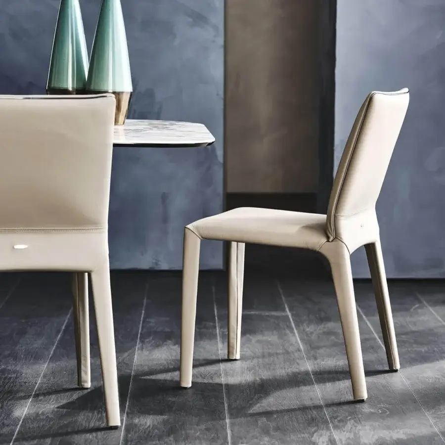 Elegant Cattelan Italia Penelope chair with smooth light beige soft leather and slender steel frame