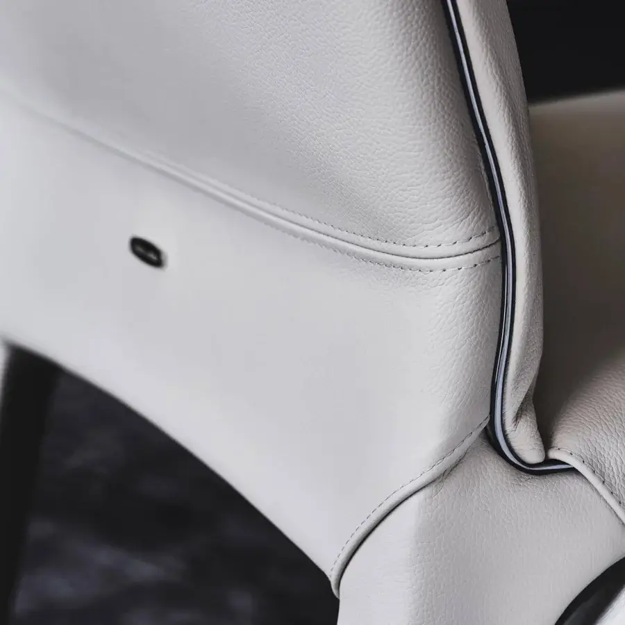 Superior Cattelan Italia Penelope chair crafted in light-toned leather with gun metal grey piping and a steel frame