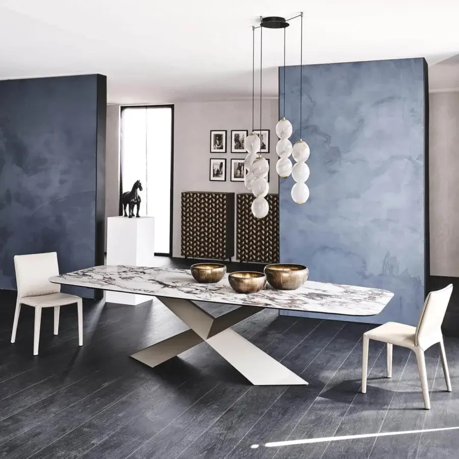 Captivating Cattelan Italia Penelope chair in light beige leather with a gun metal steel frame and smooth matte finish