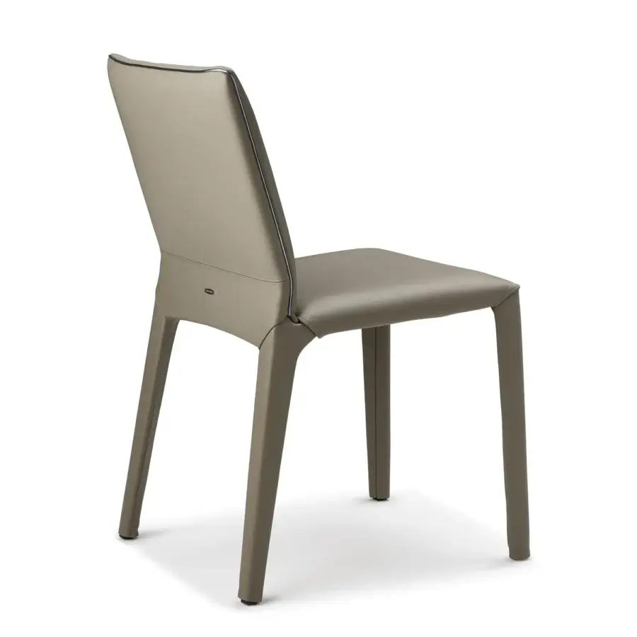 Exceptional Cattelan Italia Penelope chair in muted gray synthetic leather with sleek steel and gun metal grey piping