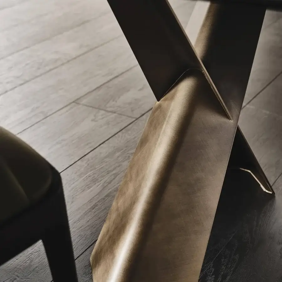Sophisticated Cattelan Italia Mad Max table with brushed bronze lacquered steel base and artistic CrystalArt glass top