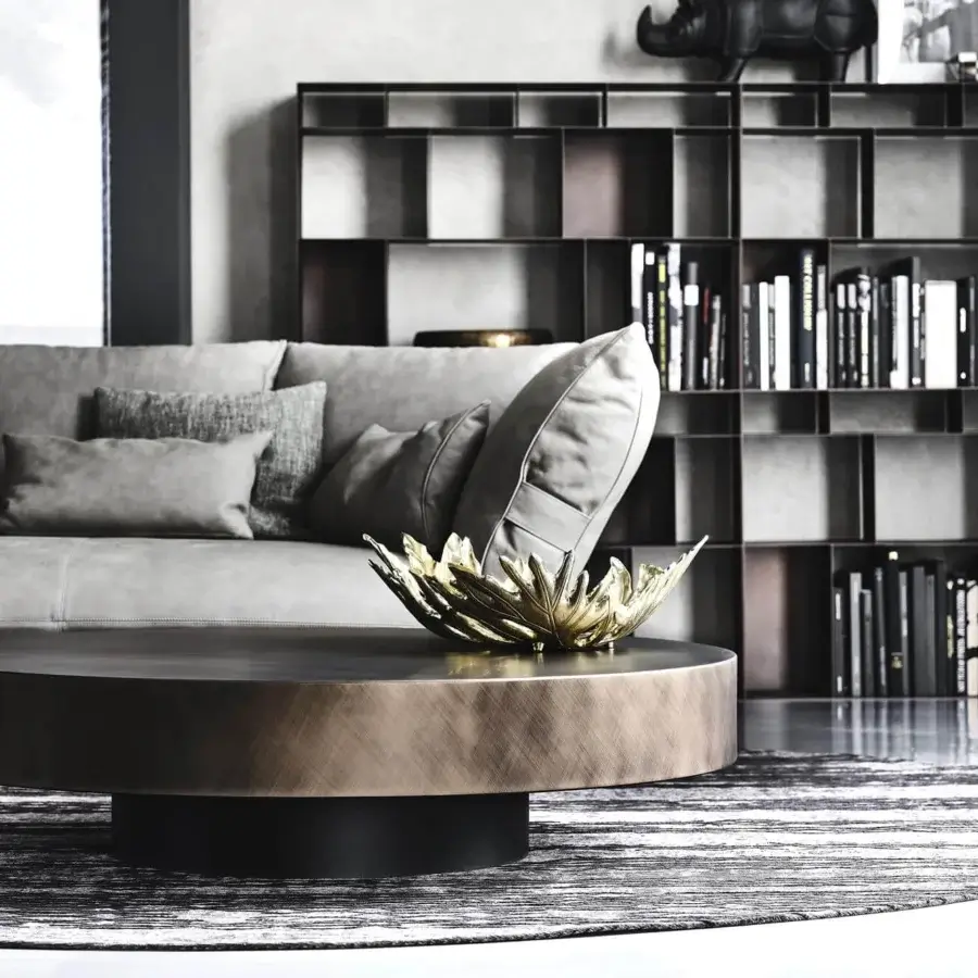 Sophisticated Cattelan Italia Arena coffee table with a shiny round top in brushed bronze lacquered steel and black embossed lacquered steel base