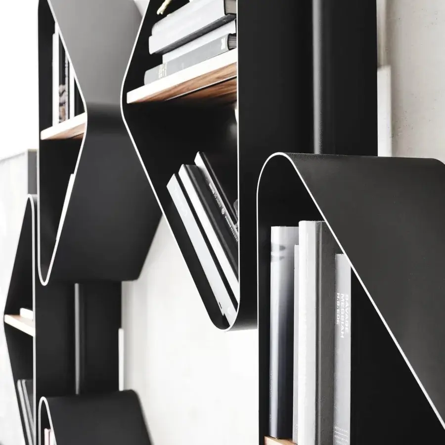 Exceptional Cattelan Italia Spinnaker bookcase with a wave-like black embossed lacquered steel frame and warm Noce Canaletto wood shelves