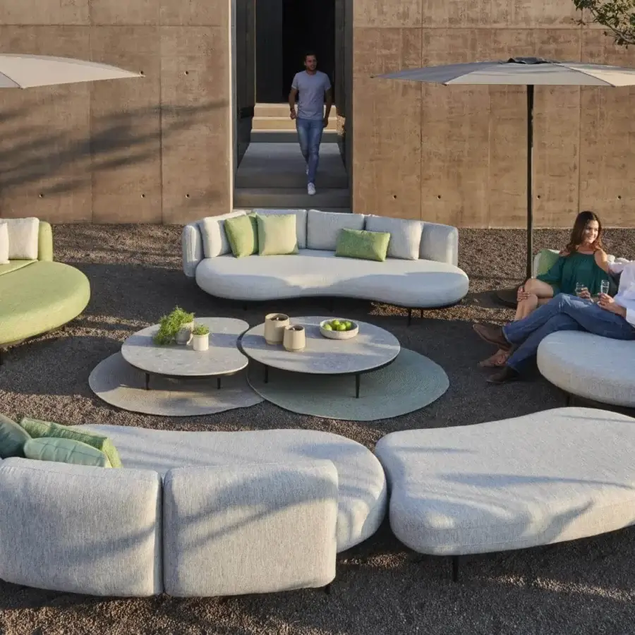Exceptional Royal Botania Organix Lounge lounger with light gray woven textile and minimal metal frame for modular outdoor seating
