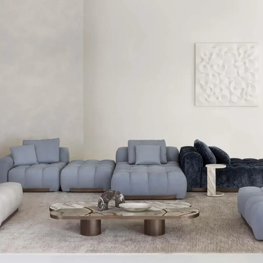 Exceptional Rugiano Yacht sectional with soft lines upholstered in light blue-gray and deep navy textile with a matte finish