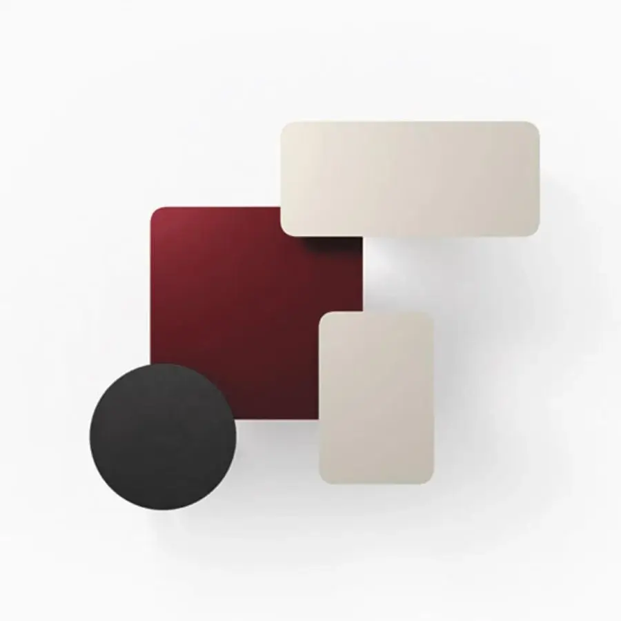 Distinguished LaCividina U coffee table with a burgundy and beige matte tabletop and sleek black bent aluminum base