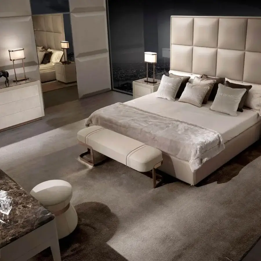 Exceptional DV Home Collection Coco bench crafted with a comfortable light beige textile and glossy golden steel legs