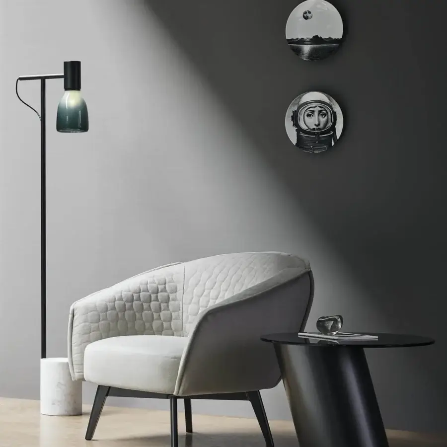 Distinguished Bonaldo Bruno lounge chair with light gray fabric upholstery and sleek matt painted metal base