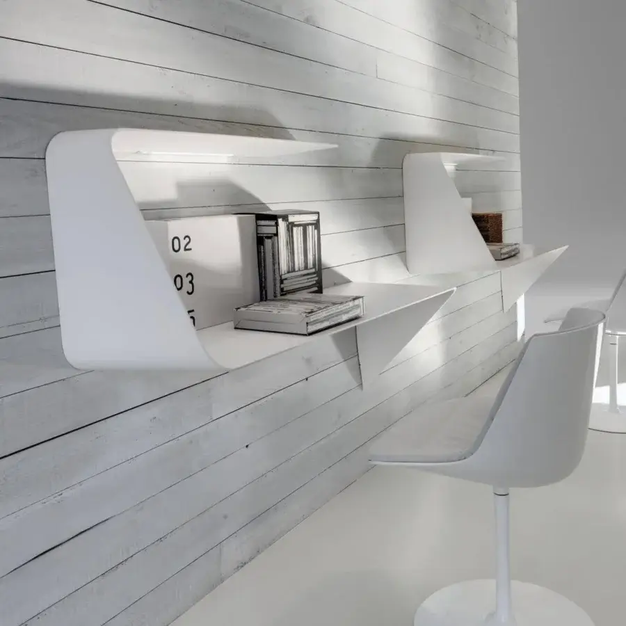 Distinctive MDF Italia Mamba desk with a wavy cantilevered form in matt white Cristalplant® and touch-sensitive LED light