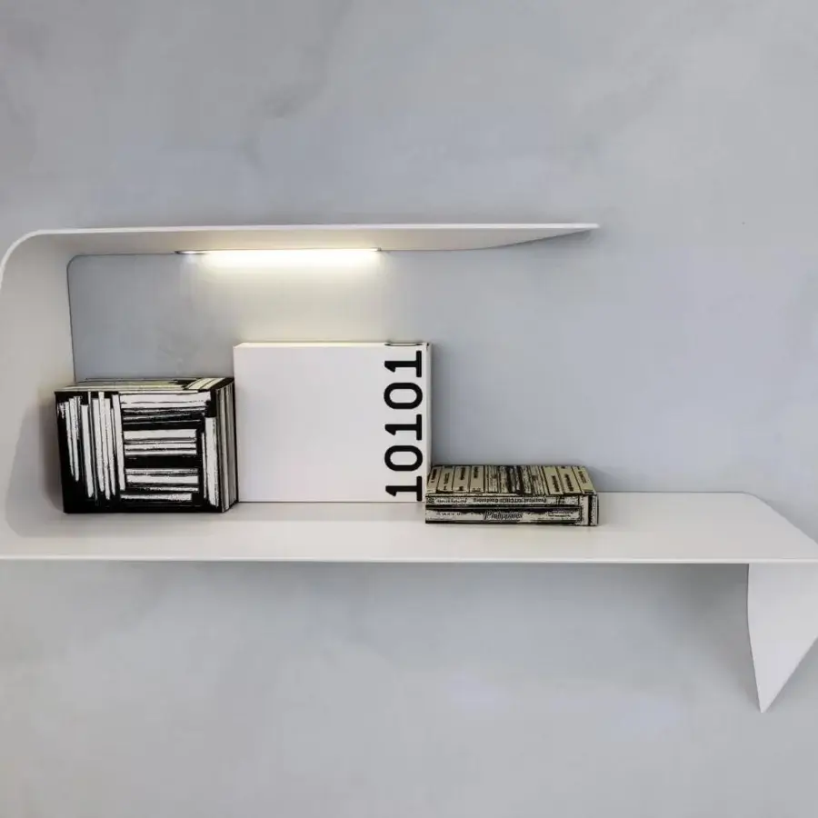 Cutting-edge MDF Italia Mamba desk crafted in matt white Cristalplant® with a continuous wavy form and integrated adjustable HD LED light