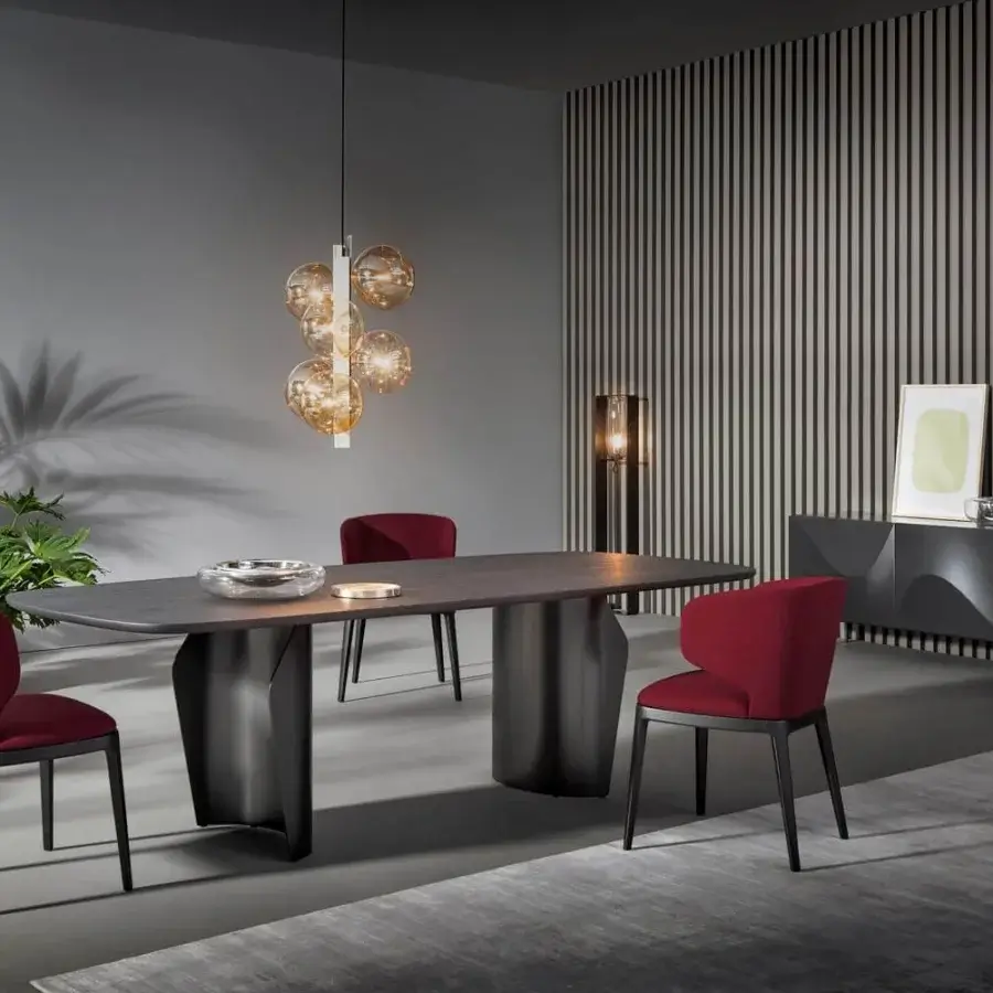 Elegant Bonaldo Flame table with sinuous dark gray ceramic top and sculptural dark metal double base