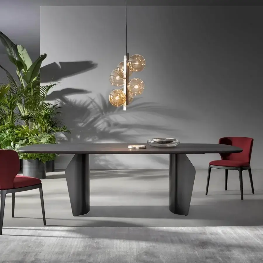 Distinguished Bonaldo Flame table with elongated dark wood top and double base crafted in textured dark material