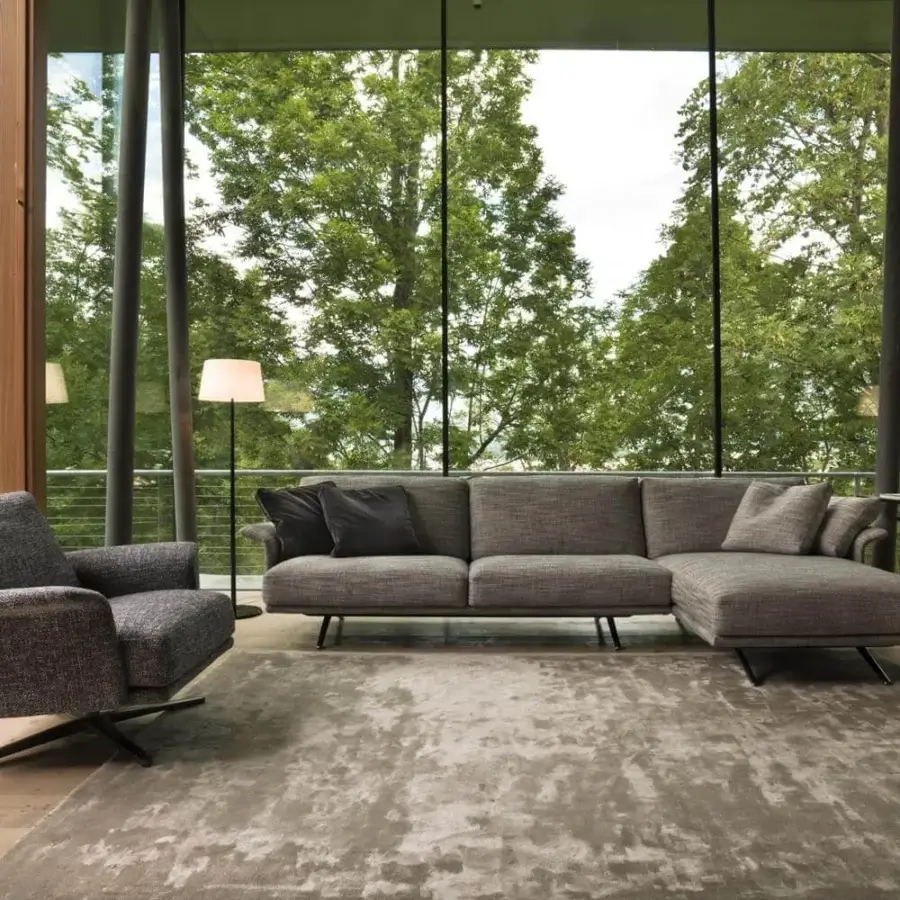 Elegant Verzelloni Nilson sectional with textured matte gray fabric upholstery and curved armrests