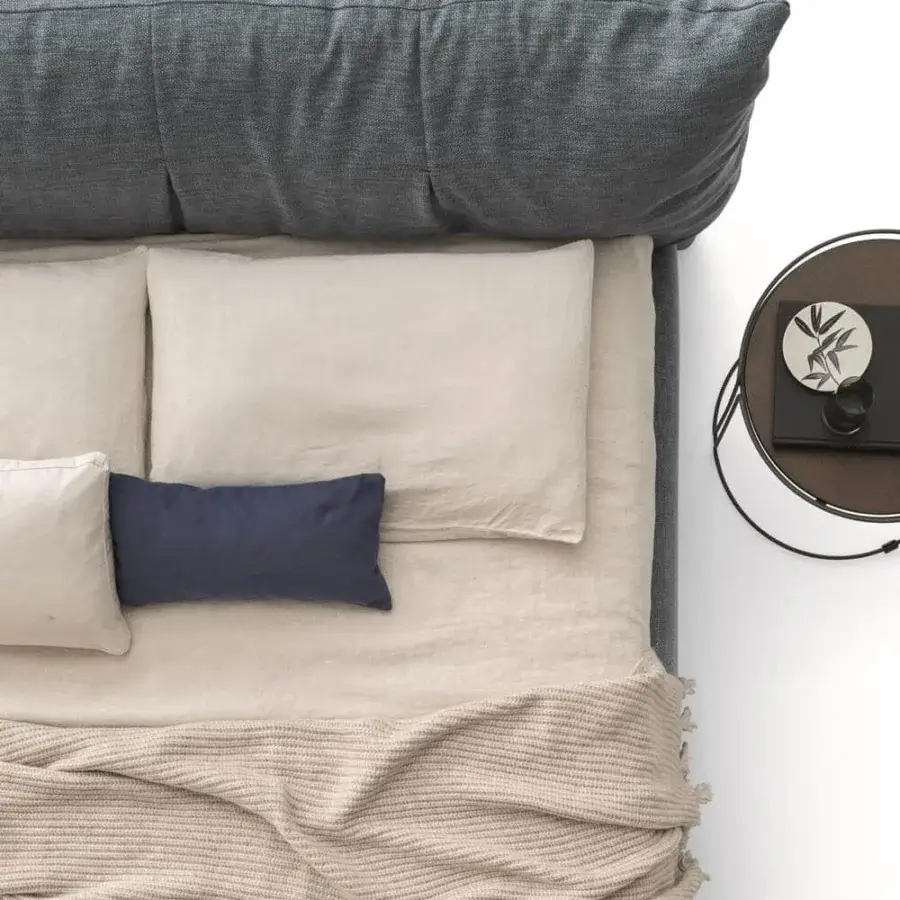 Exceptional Ditre Italia Papilo bed with oversized headboard cushions in muted blue-gray textile and light beige bedding