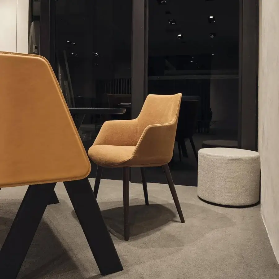 Distinguished Presotto Divina armchair with soft shape upholstered in mustard-colored textile and dark brown lacquered ash legs