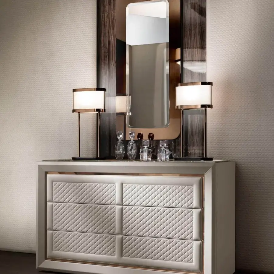 Exceptional DV Home Collection Adler dresser crafted in Italy with cream leather and stainless steel metal inserts exhibiting refined quilting