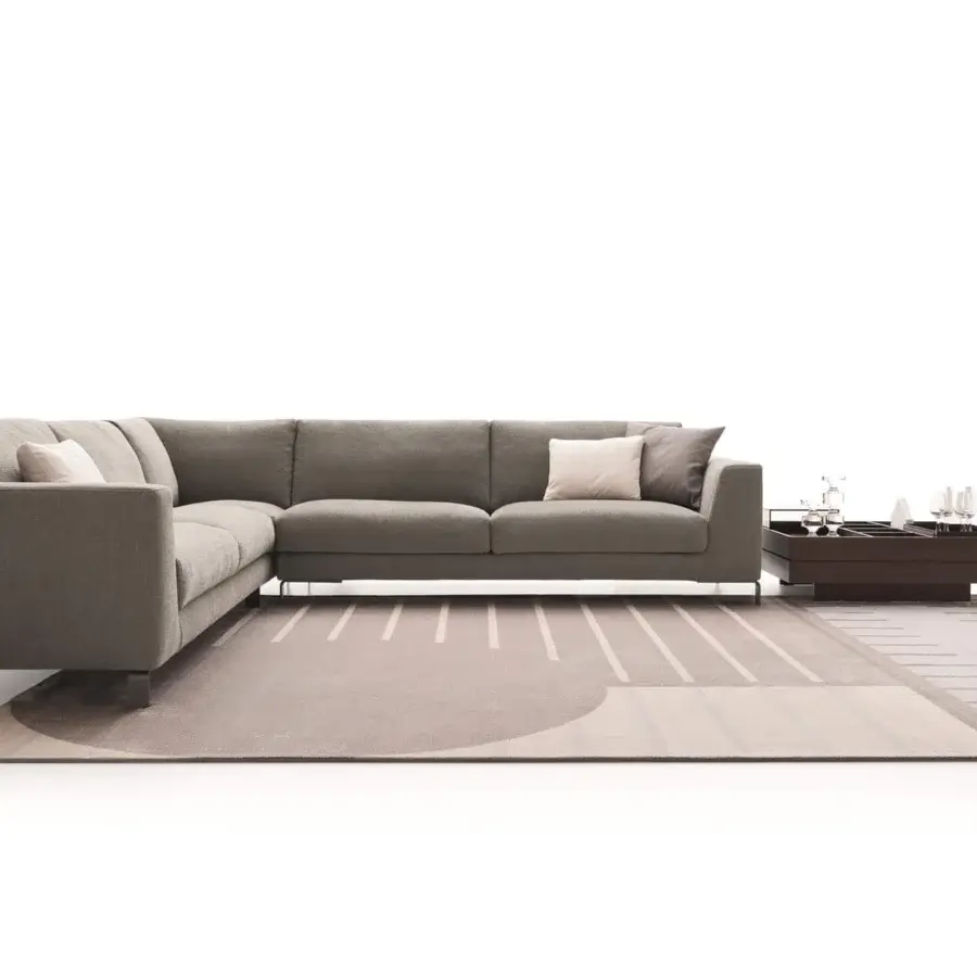 Distinguished Ditre Italia Artis sectional with muted gray textile upholstery and “Punto Pettine” stitching, built with slim metallic legs