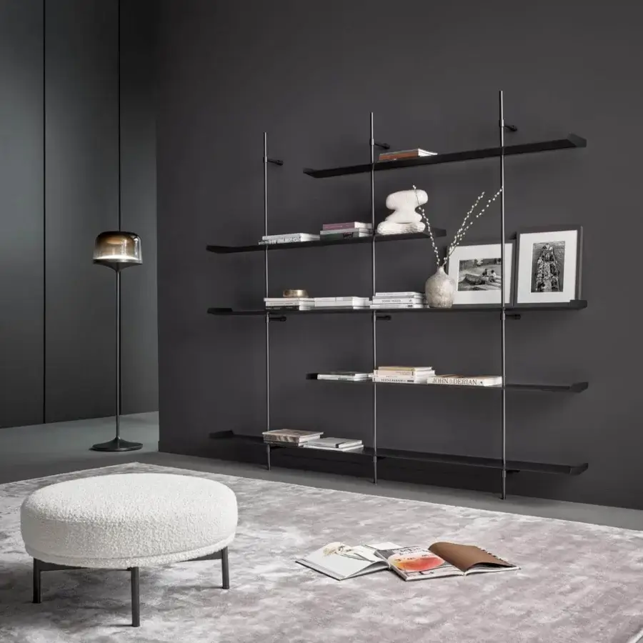 Superior Bonaldo Foil bookcase with dark matte shelves supported by thin cylindrical metal uprights crafted in painted aluminum