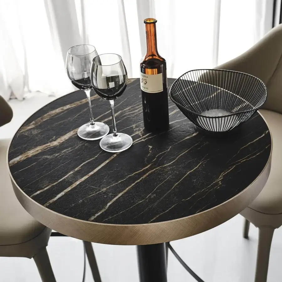 Elegant Cattelan Italia Ribot bar table with glossy Marmi Portoro ceramic and black embossed lacquered steel base