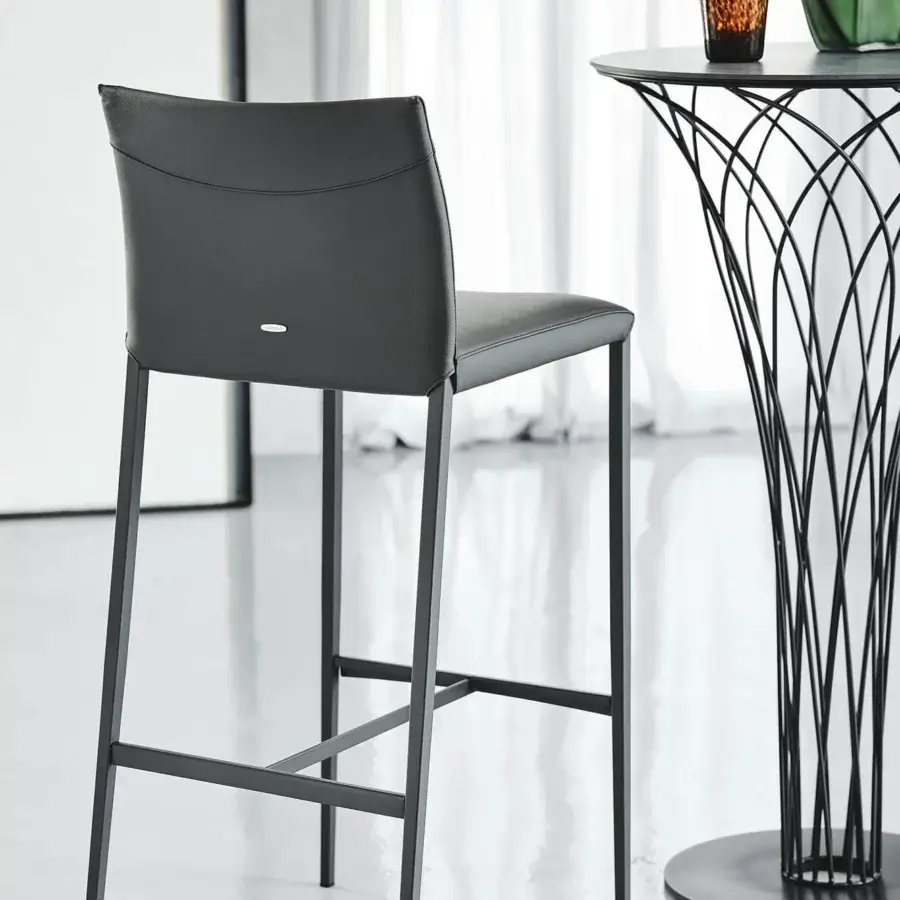 Sophisticated Cattelan Italia Norma stool with graphite embossed lacquered steel and dark gray synthetic material upholstery