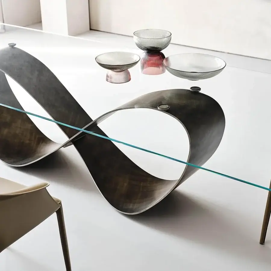 Distinguished Cattelan Italia Butterfly table with a clear glass top and infinity-shaped brushed grey lacquered steel base