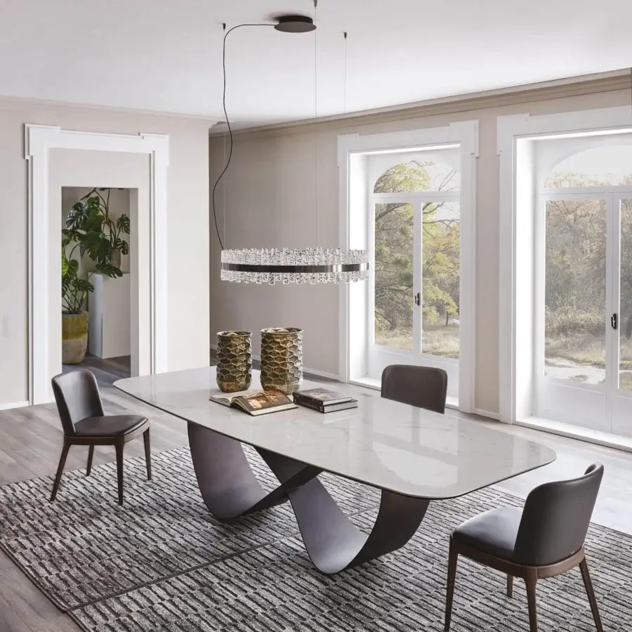 Sophisticated Cattelan Italia Butterfly table with alabastro marmi ceramic top and titanium embossed lacquered steel base