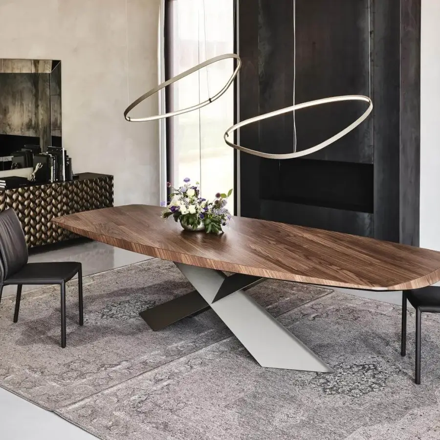 Elegant Cattelan Italia Tyron table with Canaletto walnut barrel top and matte graphite embossed lacquered steel base