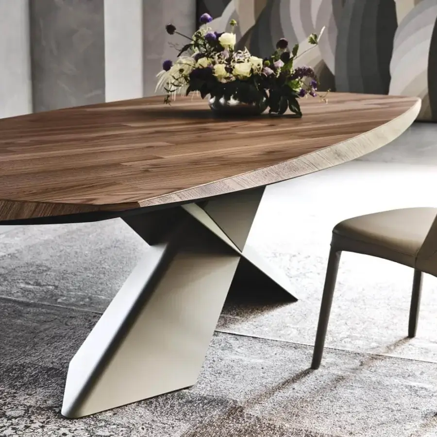 Distinguished Cattelan Italia Tyron table with barrel top in Canaletto walnut and graphite embossed lacquered steel base