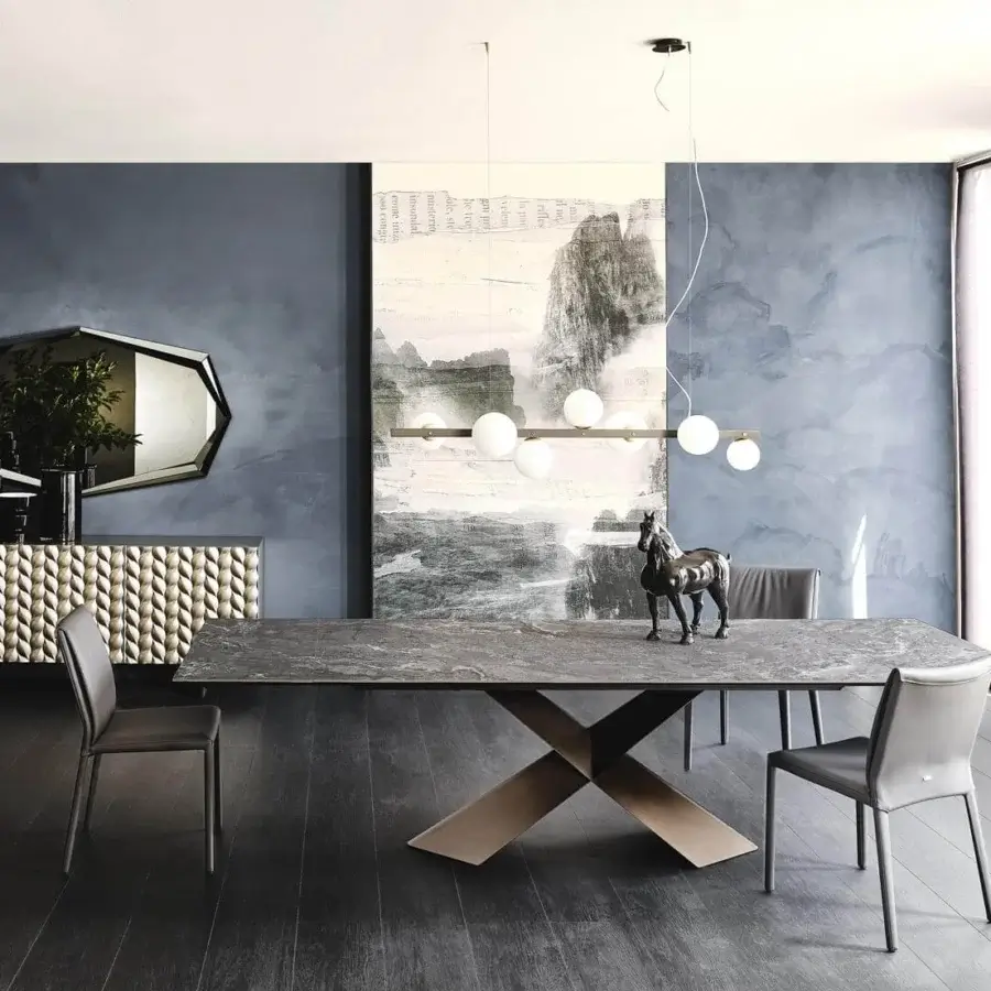 Exceptional Cattelan Italia Tyron table with textured Ardesia ceramic top and embossed lacquered steel X base in bronze finish