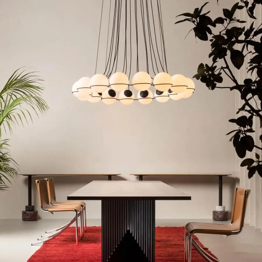 Sophisticated Acerbis Maestro table with a brushed open grain medium density wood fibre top and geometric black ash base