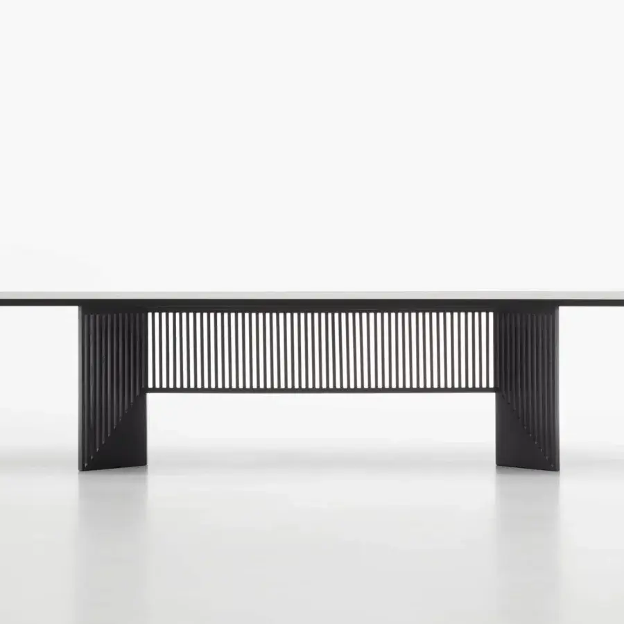 Elegant Acerbis Maestro table with a solid black ash wood base and brushed open grain matte black medium-density wood fibre tabletop