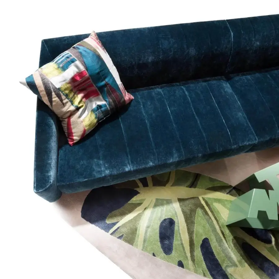 Exceptional Erba Belladonna sofa with solid wood frame and plush polyester-fiber padding upholstered in deep teal velvet with refined quilting