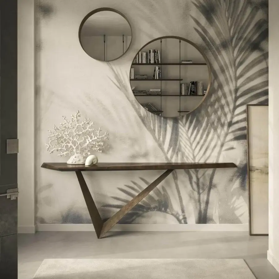 Avant-garde Cattelan Italia Varenne console with a warm brown wooden top and shaped edges built with a V-shaped metal base