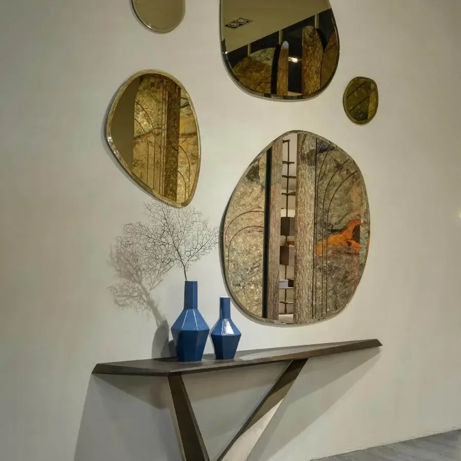 Exceptional Cattelan Italia Varenne console with a wooden top displaying diagonal strips and a geometrically shaped golden metal base