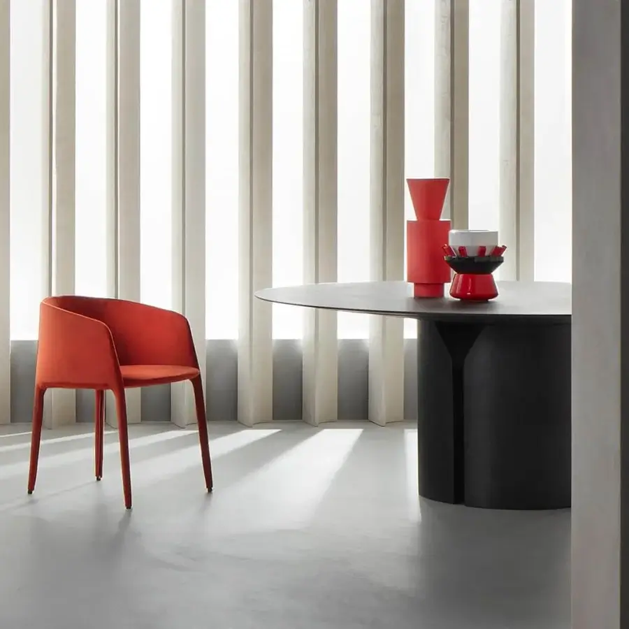 Distinguished MDF Italia NVL table crafted in Italy with a round top and dual-pillar base in monochromatic black lacquer finish