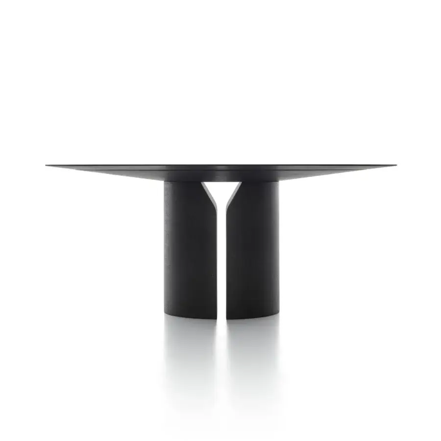 Distinguished MDF Italia NVL table crafted in monolithic medium density fibreboard with black slate reconstructed stone finish
