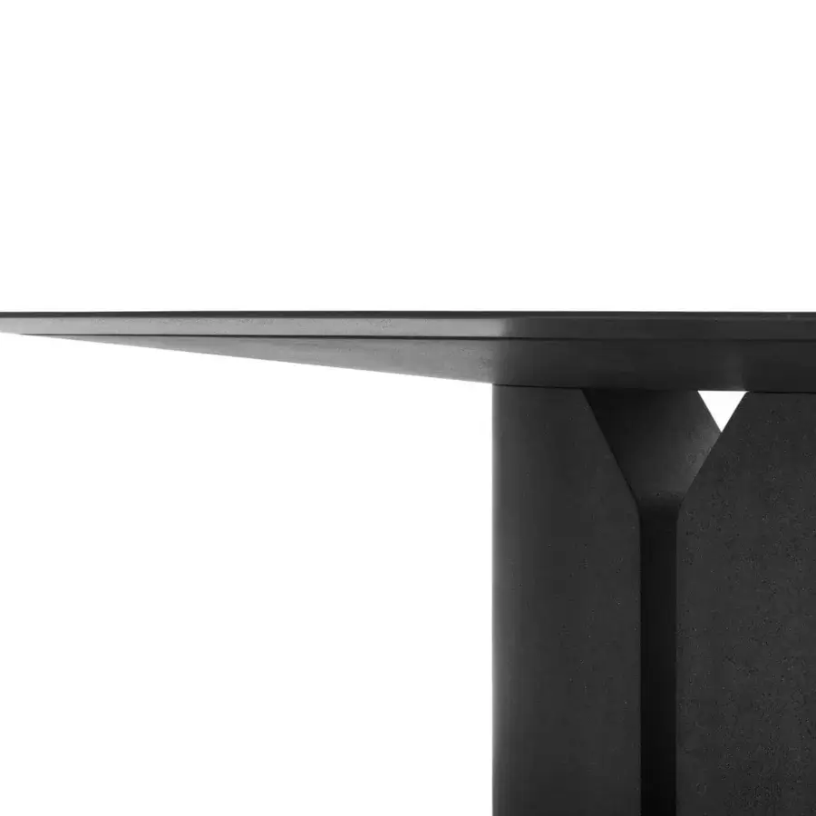 Exclusive MDF Italia NVL table built with black slate reconstructed stone and a V-shaped central element for balanced proportions