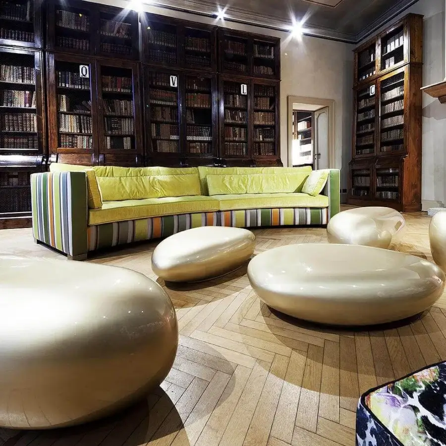 Superior Erba Invece ottoman crafted in light gold polymeric material with smooth rounded form and glossy finish