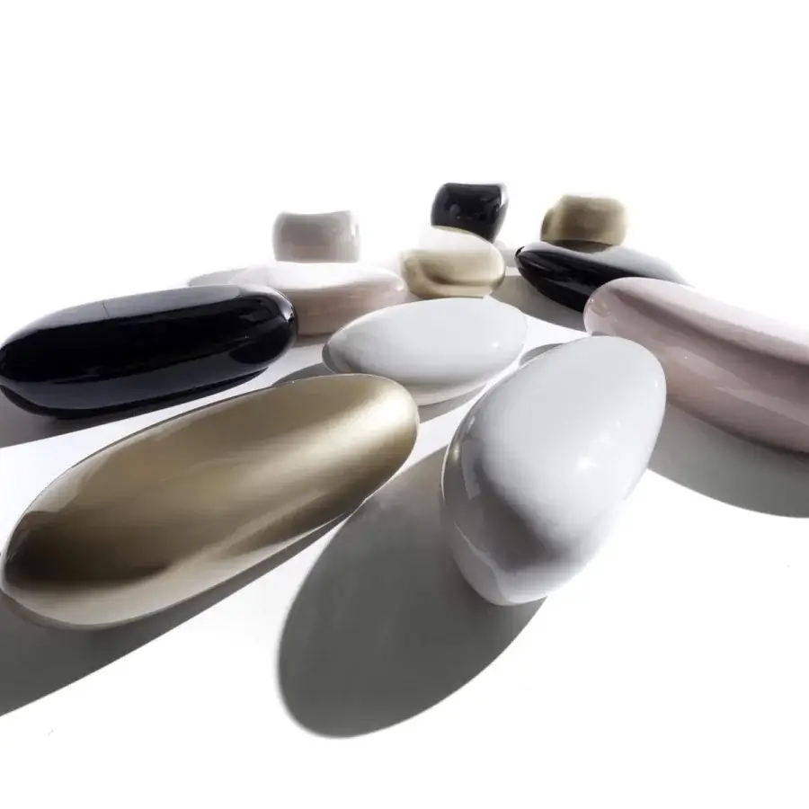 Distinguished Erba Invece ottoman with ergonomic form crafted in glossy taupe polymeric material