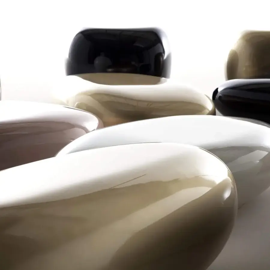 Superior Erba Invece ottoman with lightweight polymeric build in black, taupe, beige, and gray with glossy finish