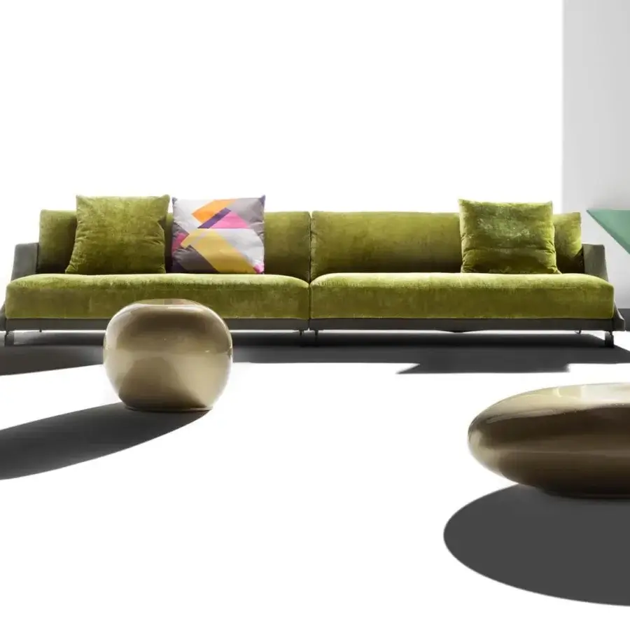 Innovative Erba Invece coffee table built in Italy with bronze polymeric material and glossy finish