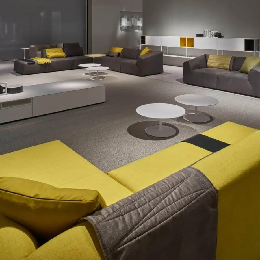 Elegant MDF Italia Flow coffee table with sleek round top crafted in matt white Cristalplant® and matching pedestal base