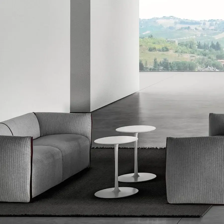 Superior MDF Italia Flow coffee table with oval matt white Cristalplant® tabletop and painted aluminum leg