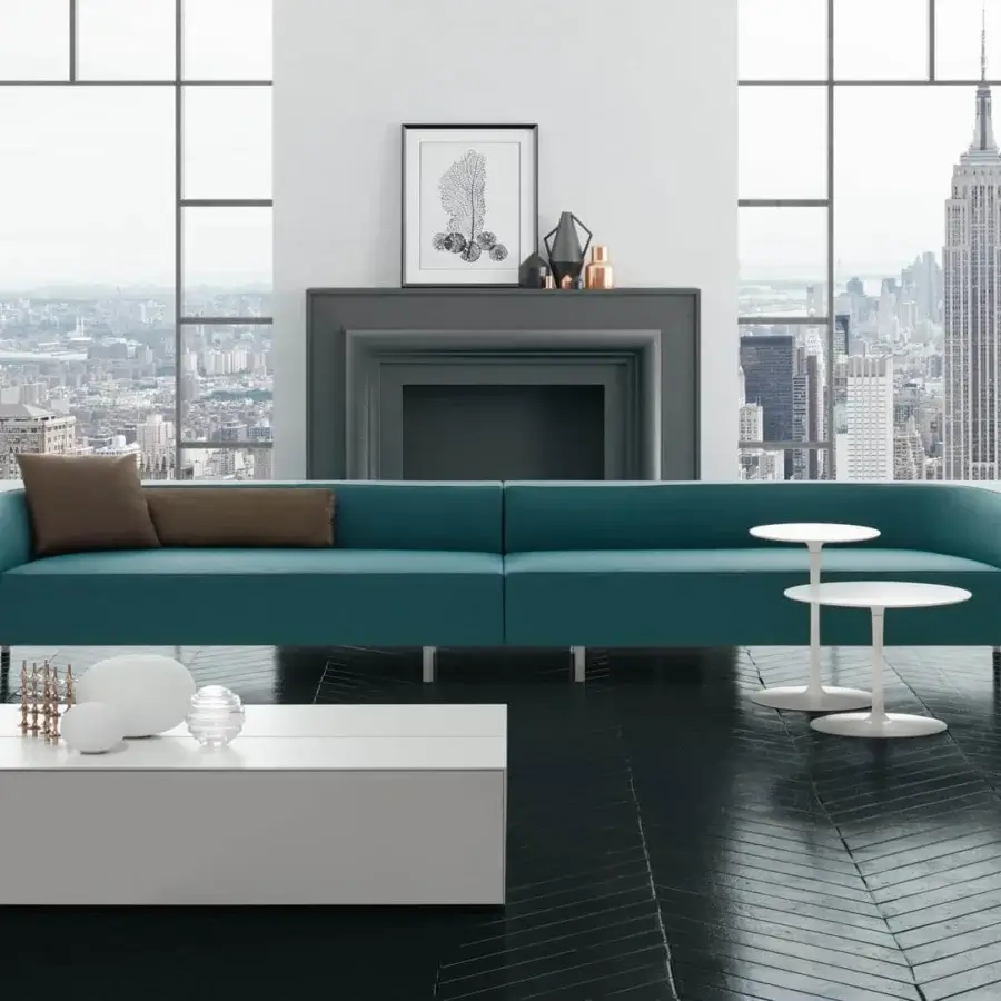 Distinguished MDF Italia Flow coffee table with wide matte white Cristalplant® top and painted aluminum base