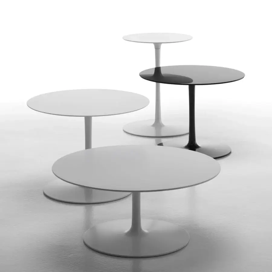Distinguished MDF Italia Flow coffee table with matt white Cristalplant® tabletop and painted aluminum base