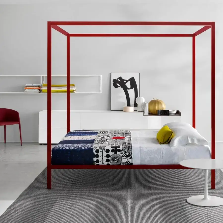 Elegant MDF Italia Flow nightstand in crisp matte white Cristalplant® with four horizontally aligned drawers and a smooth finish