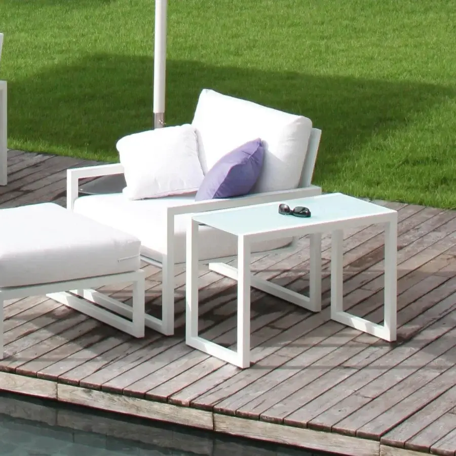 Superior Royal Botania Ninix lounge side table with white coated aluminium frame and clear glass tabletop
