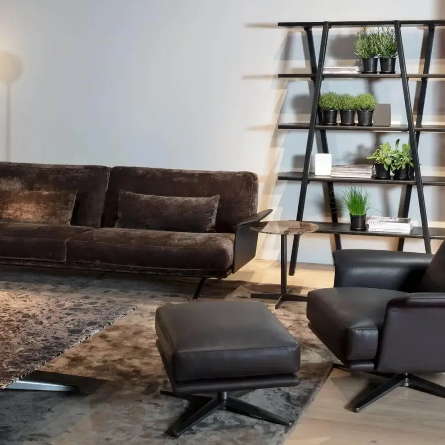 Exclusive Verzelloni Nilson sofa with curved armrests upholstered in dark brown textile with a matte finish